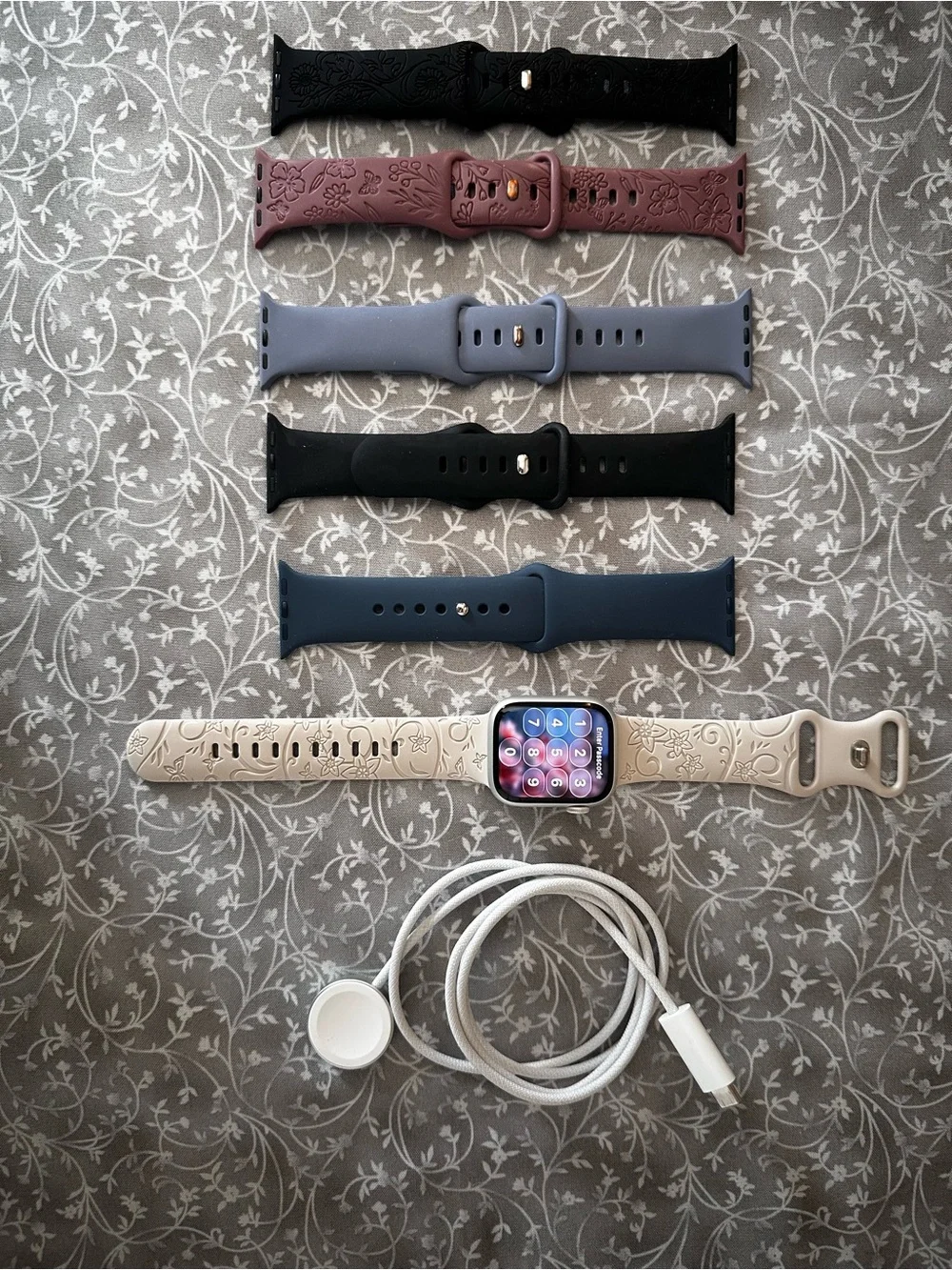 Series 9 Apple Watch with Multiple Bands — Black, Pink, Blue, Cream
